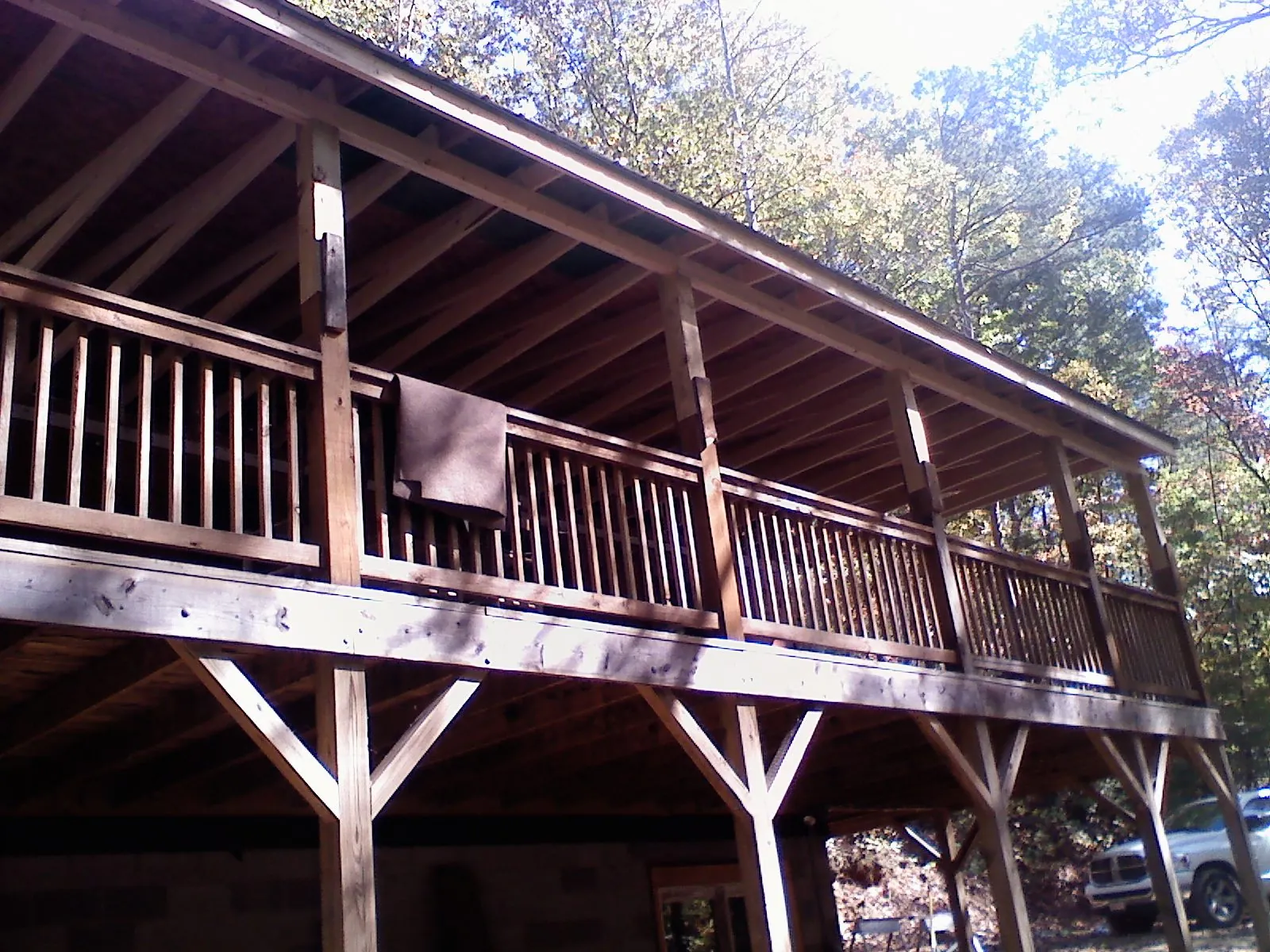 Timber framing under a new elevated porch and deck — Roof Leak Repair in Dunnsville by Roofing Brothers